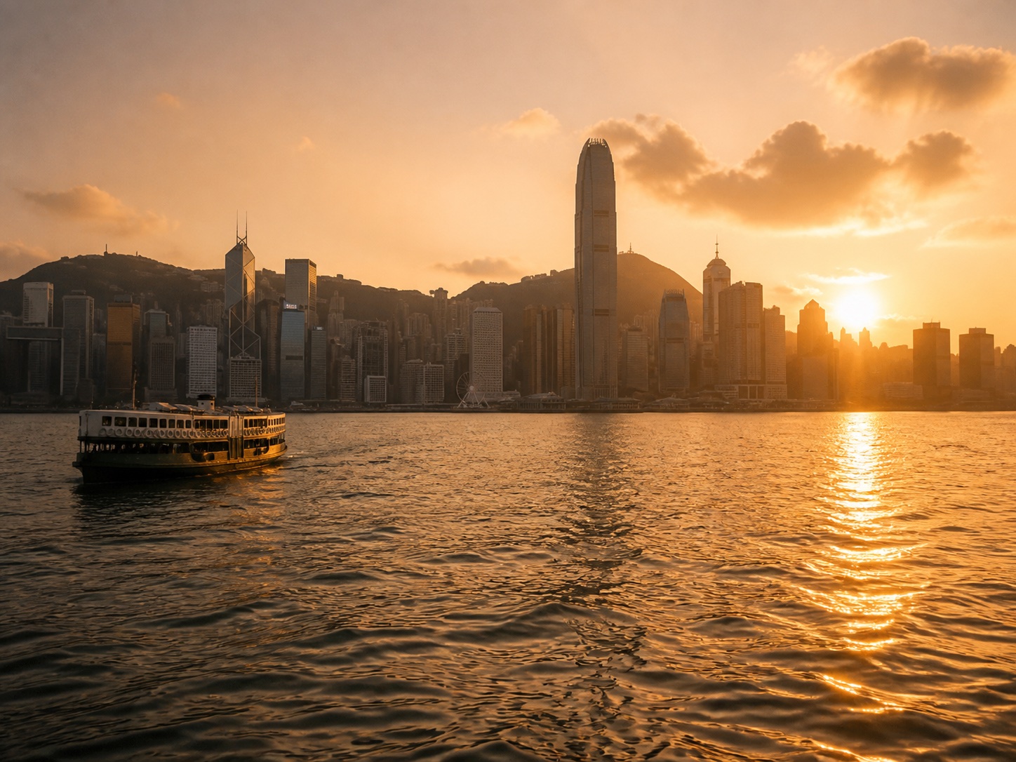 Hong Kong harbour and skyline in warm golden light